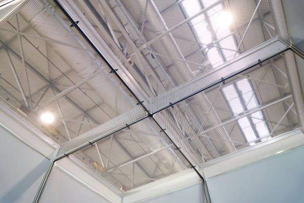 Exhibition stand design equipment. Booth template, Empty exhibition kiosk, with copy space, futuristic interior suspending lighting fixtures, shelves and tv screen.